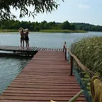 شقة Dom Nad Jeziorem Rasząg